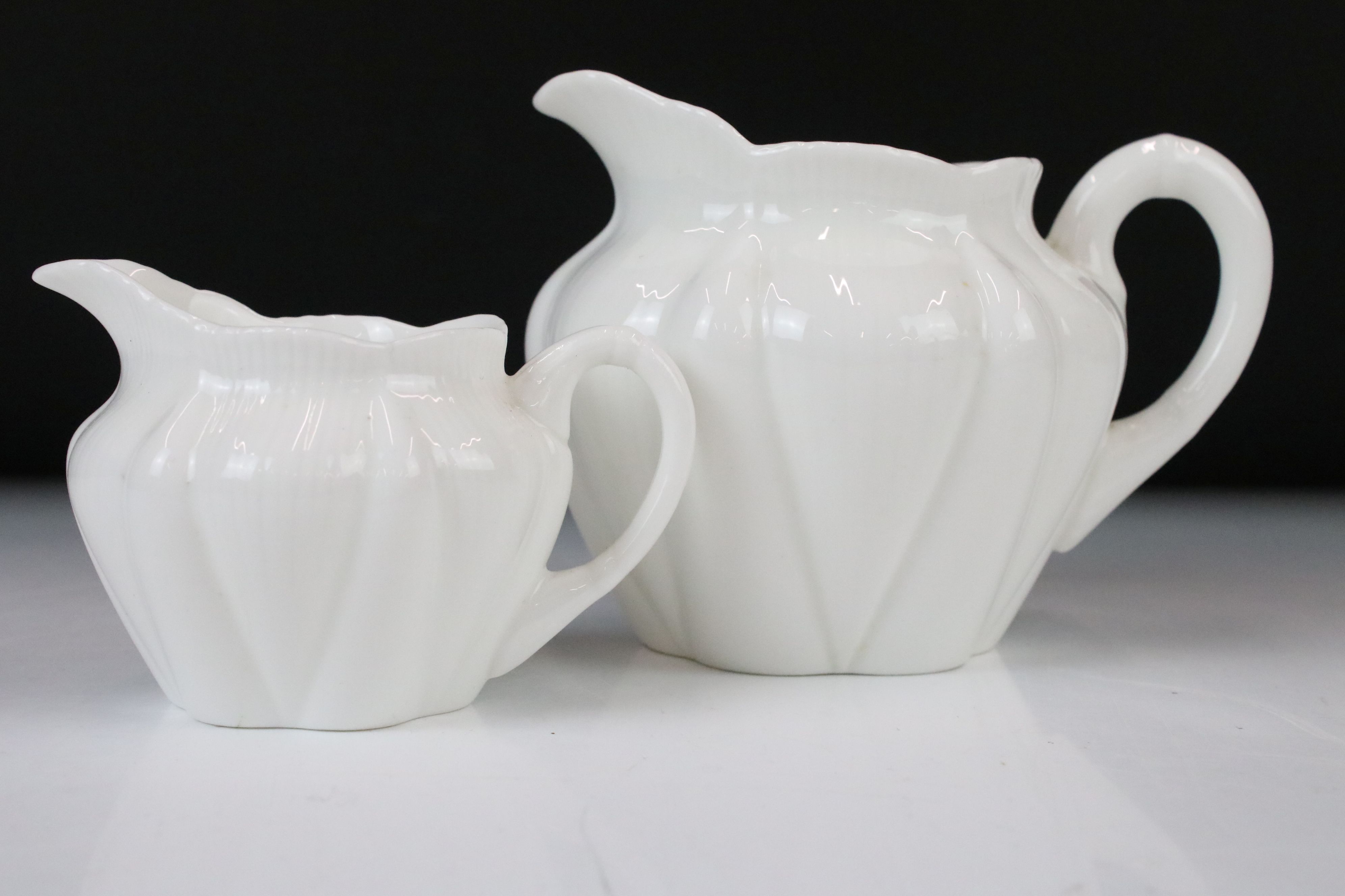 Shelley & Foley Dainty White Tea Wares of moulded lobed form, with leaf decoration (Shelley reg - Image 19 of 28