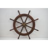 Large Wooden Eight Spoke Ships Wheel with central metal fitting and turned wooden exterior