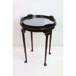 Edwardian Mahogany Circular Table with lift-out glass bottom tray top with twin brass handles,