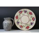 Crown Ducal charger with floral decoration on a ribbed cream ground, 32cm diameter, together with