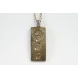 A vintage fully hallmarked sterling silver ingot pendant with necklace