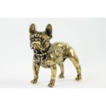 An ornamental brass figure of a French bulldog.
