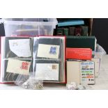 A large collection of mixed stamps to include a good quantity of mint stamp presentation packs.