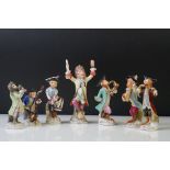 20th Century Sitzendorf Seven Piece Porcelain Monkey band, consisting of a conductor and six