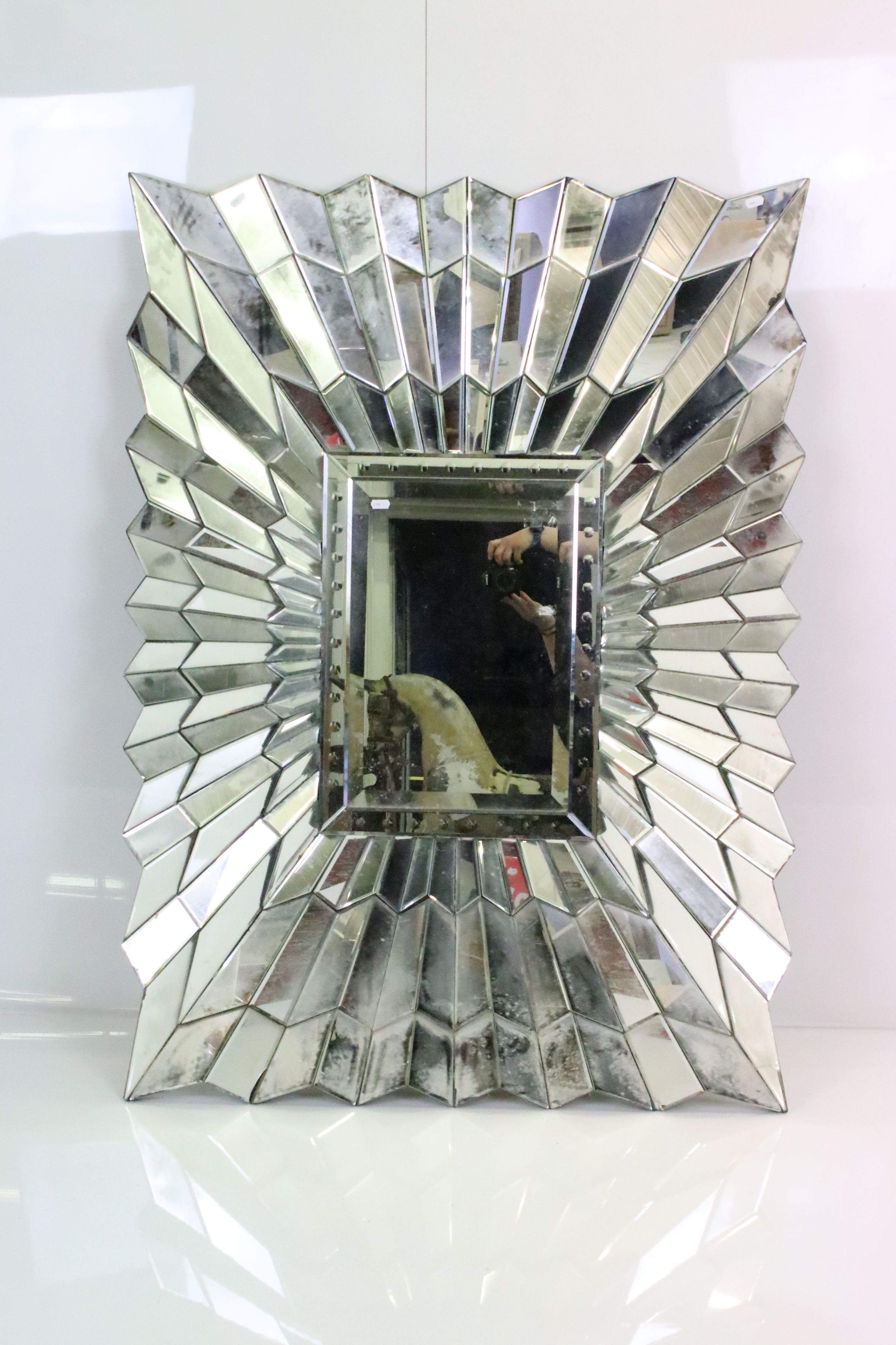 Modern Mirror with a mirrored sunburst style frame, 132cm x 96cm