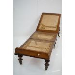 19th century Folding Campaign style Day Bed with two ratchet ends, bergere cane panels, raised on