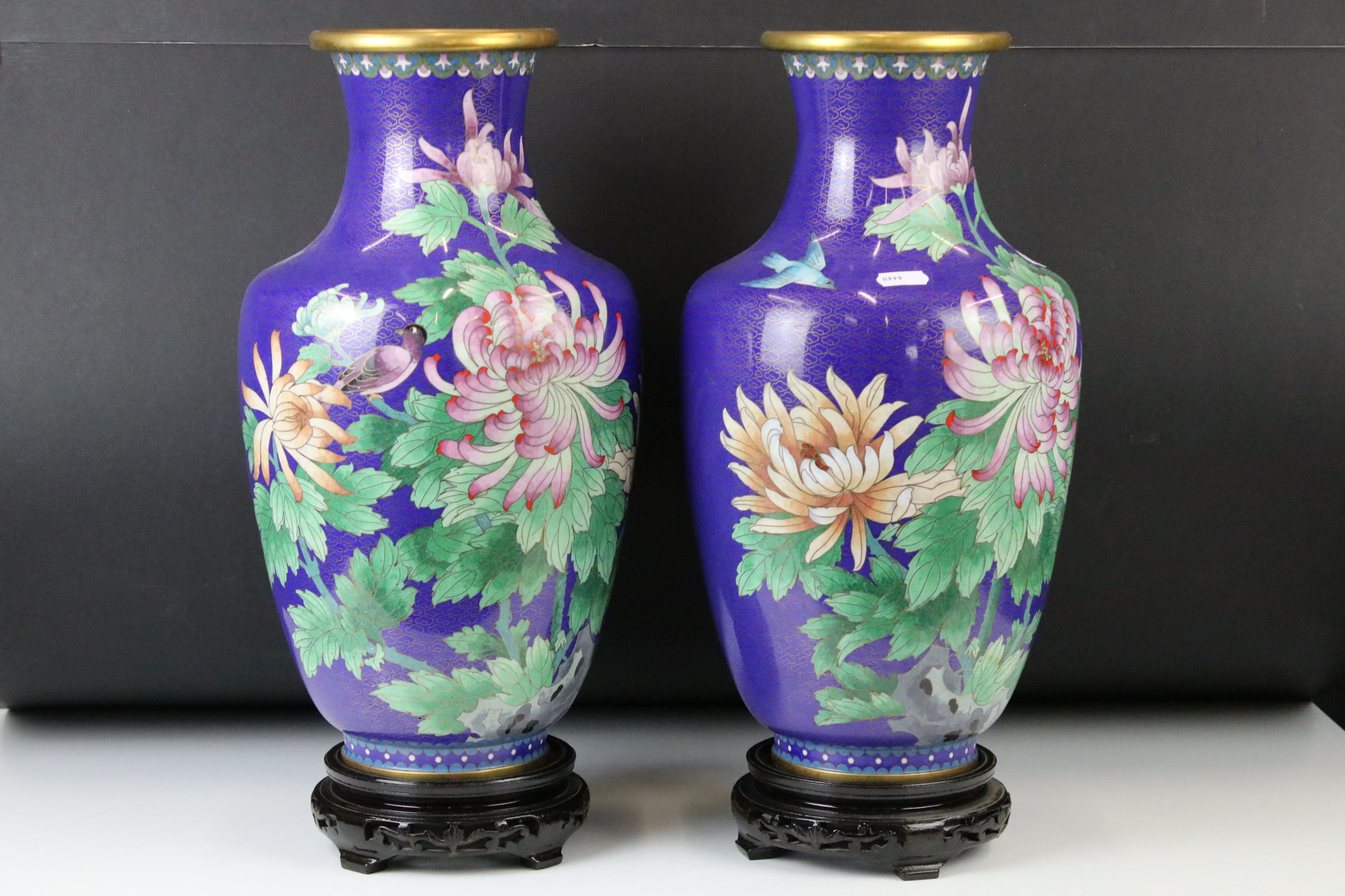 Pair of Chinese Cloisonne Baluster Vases decorated with birds and flowers on a blue ground, Jingfa