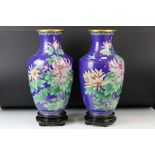 Pair of Chinese Cloisonne Baluster Vases decorated with birds and flowers on a blue ground, Jingfa
