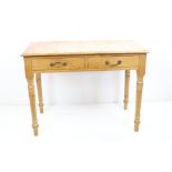 19th century Pine Side Table with two drawers raised on turned legs, 91cm long x 50cm deep x 68cm