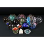Large Collection of over 70 glass paperweights in a variety of colours and sizes, featuring