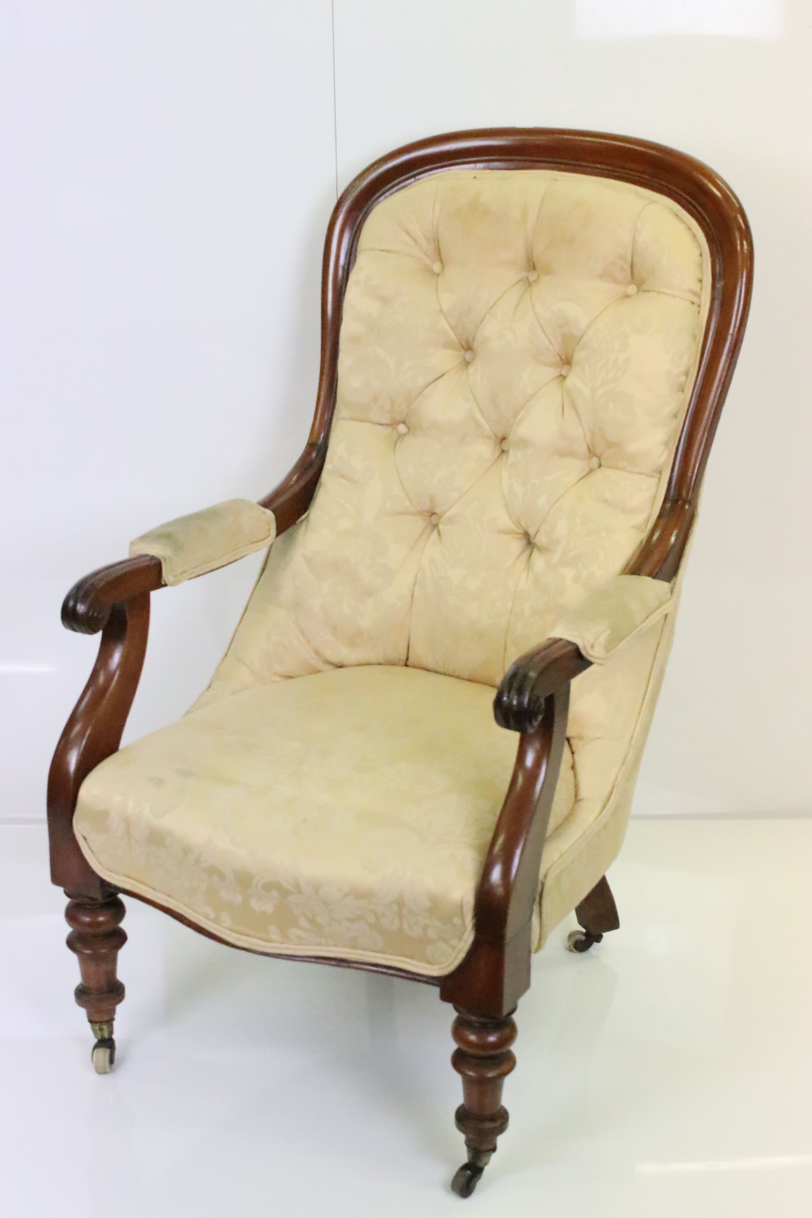 19th century Cream Upholstered Armchair, the mahogany show frame with scrolling carved arms,