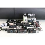 A collection of 35mm film cameras to include Olympus Trip, Canon Cannot and Olympus 35 ECR examples.