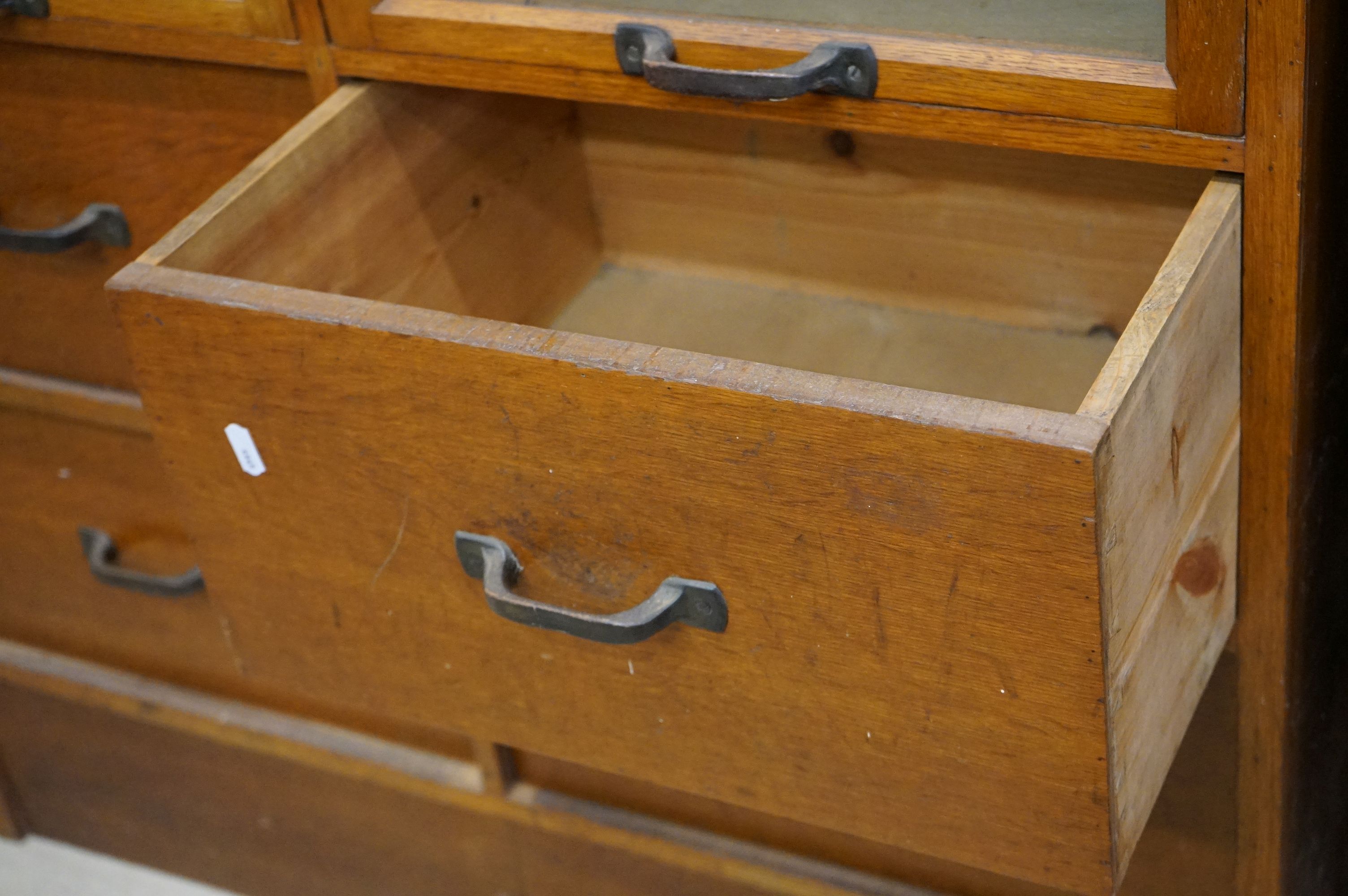 Early 20th century Shop Oak Haberdashery Cabinet with two banks of eight glass fronted drawers (16 - Image 8 of 8