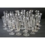 Collection of Thirty 19th Century Ale / Champagne Flutes with facet-cut bowls, knop stems and ground