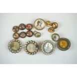 A small collection of antique buttons to include portrait examples.