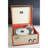 A mid 20th century red Dansette record player.