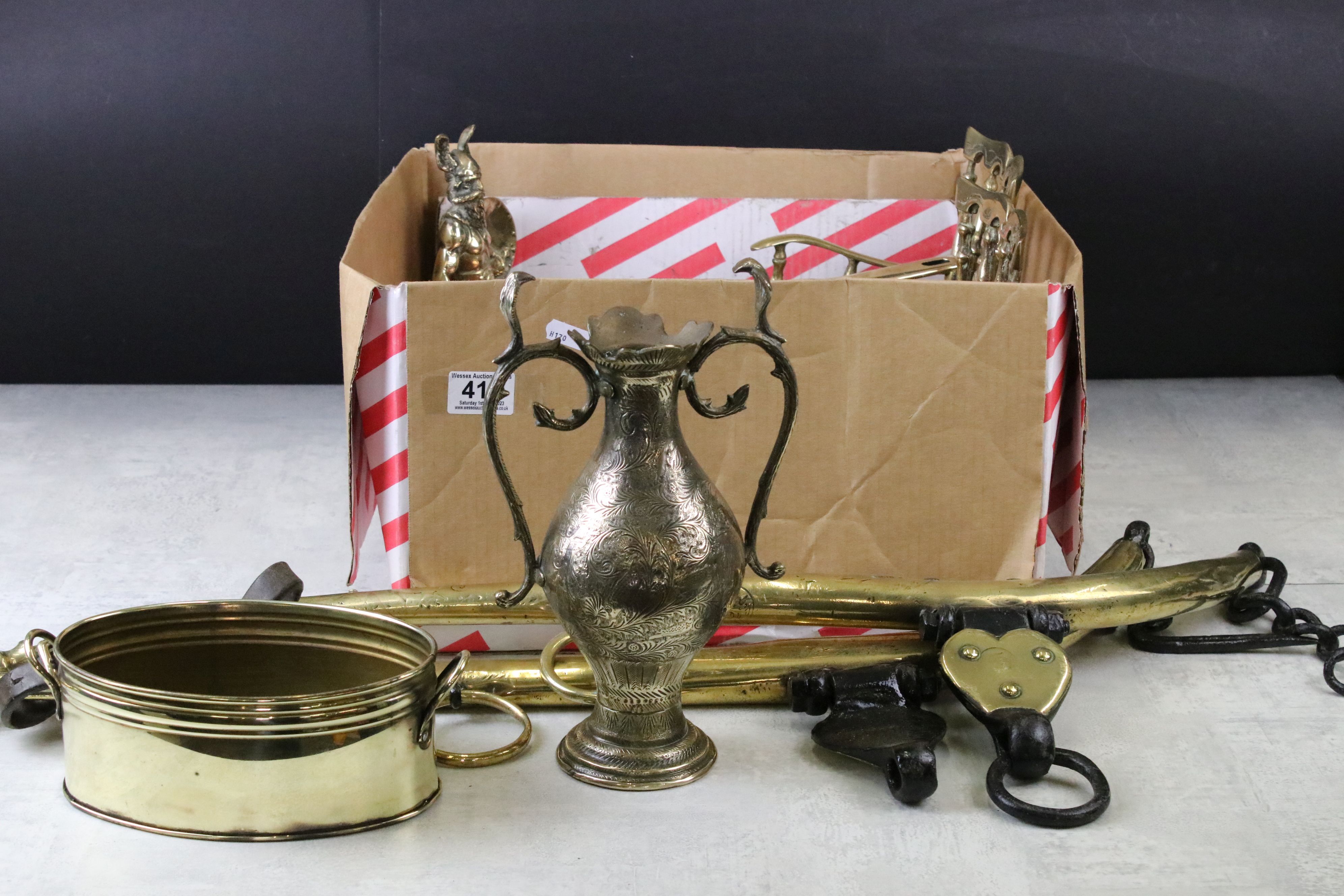 A small collection of mixed brass and copper ware to include ornamental chairs, jug, figure,