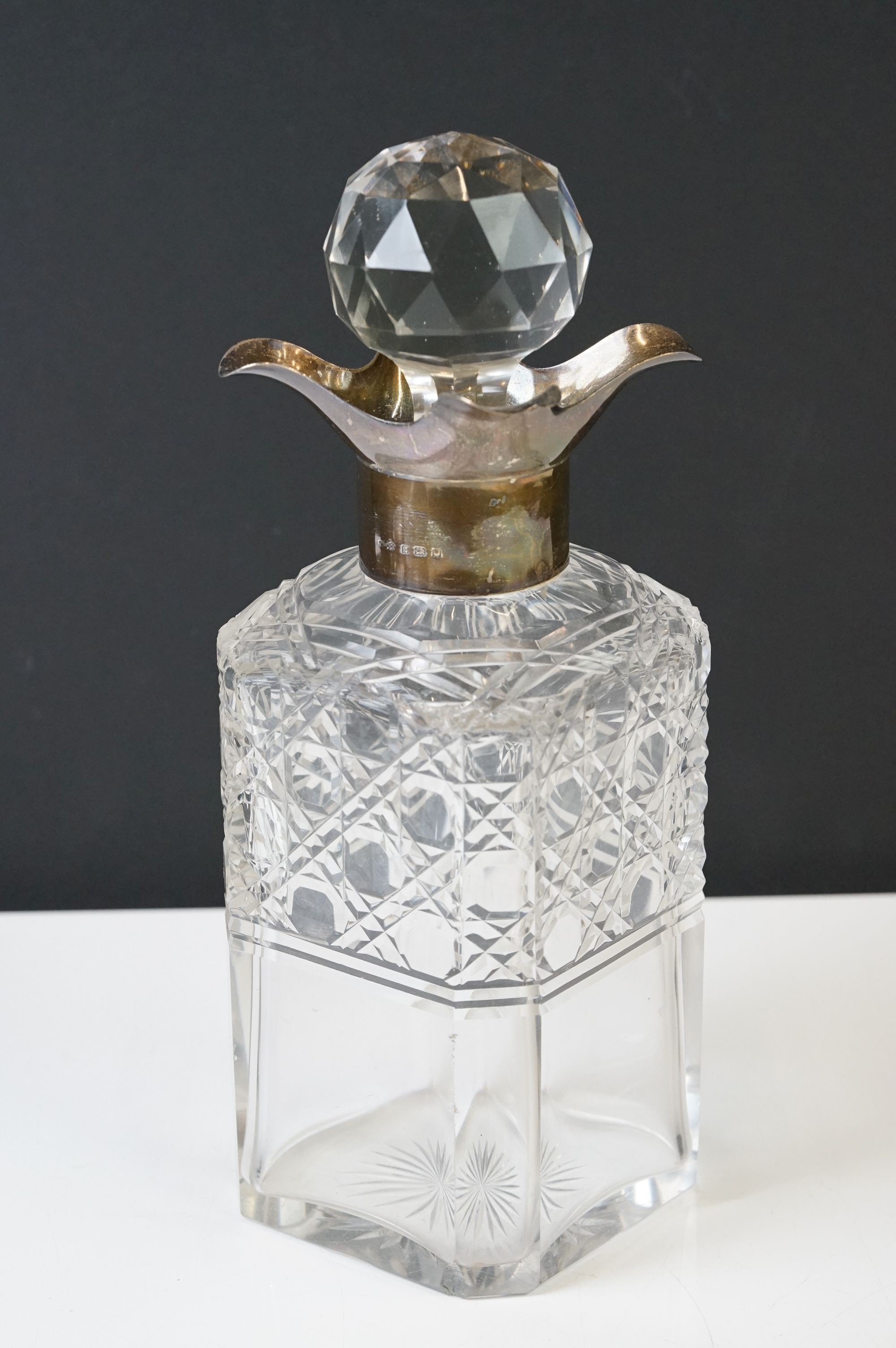 A cut glass decanter with fully hallmarked sterling silver collar, assay marked for London and dated - Image 2 of 11