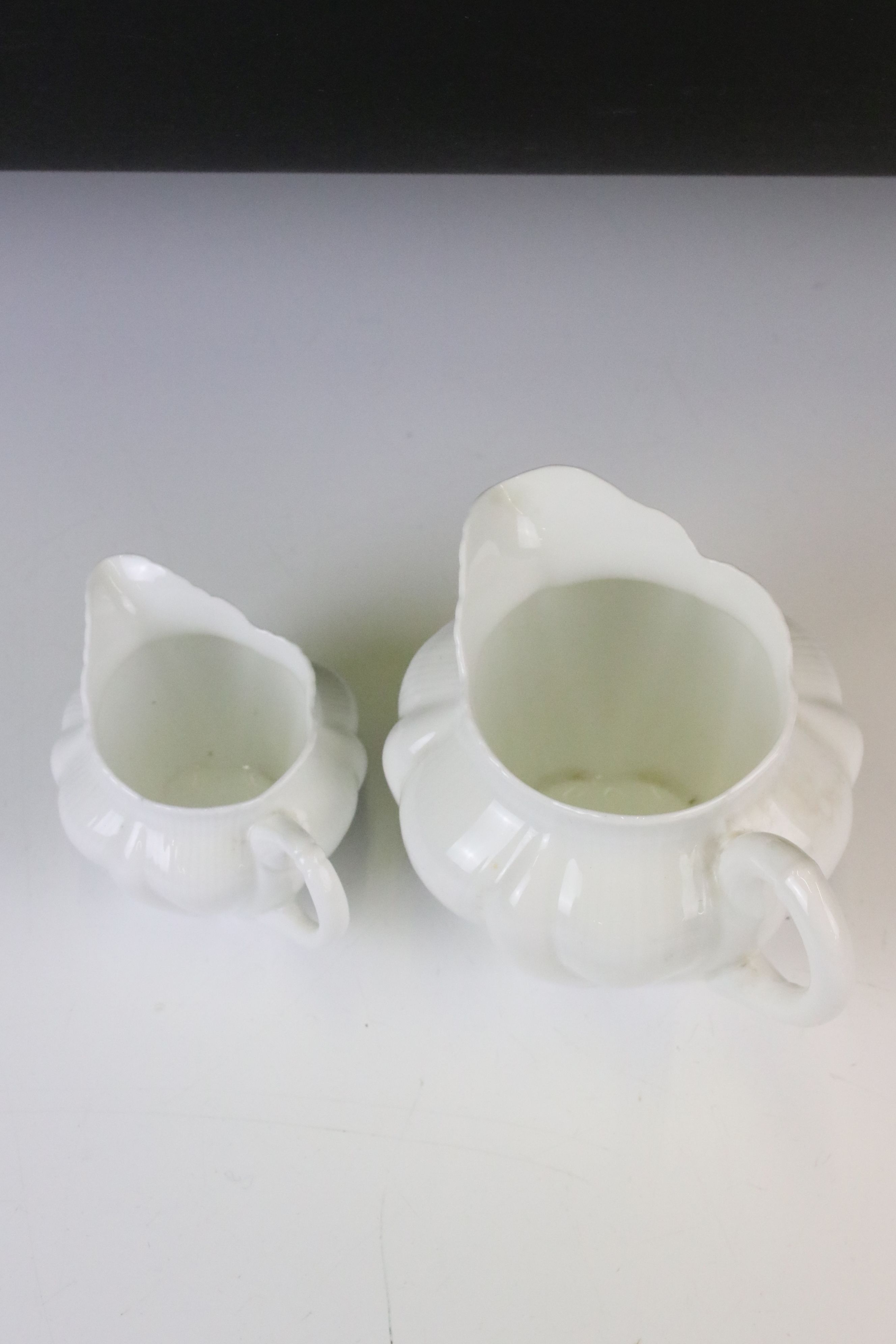 Shelley & Foley Dainty White Tea Wares of moulded lobed form, with leaf decoration (Shelley reg - Image 22 of 28