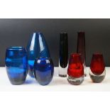 Seven 20th Century cased glass vases to include a Whitefriars tapering vase in Smoky Grey (19.5cm