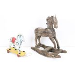 Hardwood Rocking Horse, 71cm wide x 80cm high together with a Mid century Child's Pull-along Horse