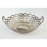 A fully hallmarked sterling silver twin handled basket with pierced decoration, assay marked for