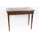 Mahogany Card Table in the Regency manner, the rectangular fold-over top opening to a green baise