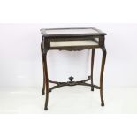 Early 20th century Bijouterie Table, the hinged lid opening to a velvet lined interior, raised on