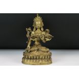 Tibetan Buddhist Bronze of Goddess White Tara in a seated position, measures 21.5cm high