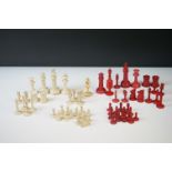 Collection of antique carved bone red & white chess pieces, tallest king stands approx 9.5cm tall