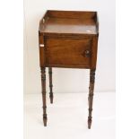 19th century Mahogany Bedside Cupboard in the Regency manner, the top with three quarter gallery and