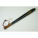 Wooden police truncheon with painted 'William IV' initials and crown, on a dark blue painted ground,