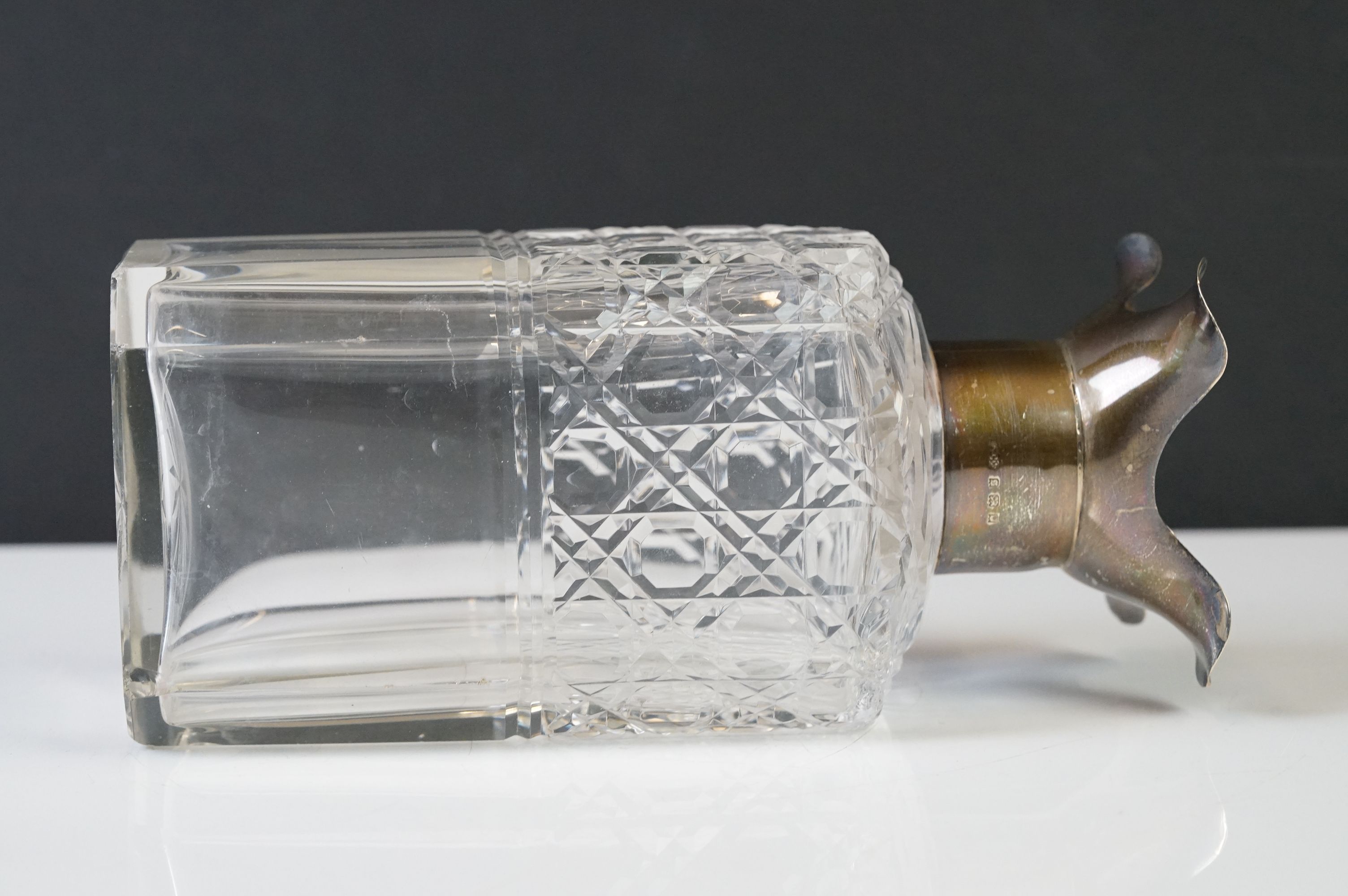 A cut glass decanter with fully hallmarked sterling silver collar, assay marked for London and dated - Image 10 of 11