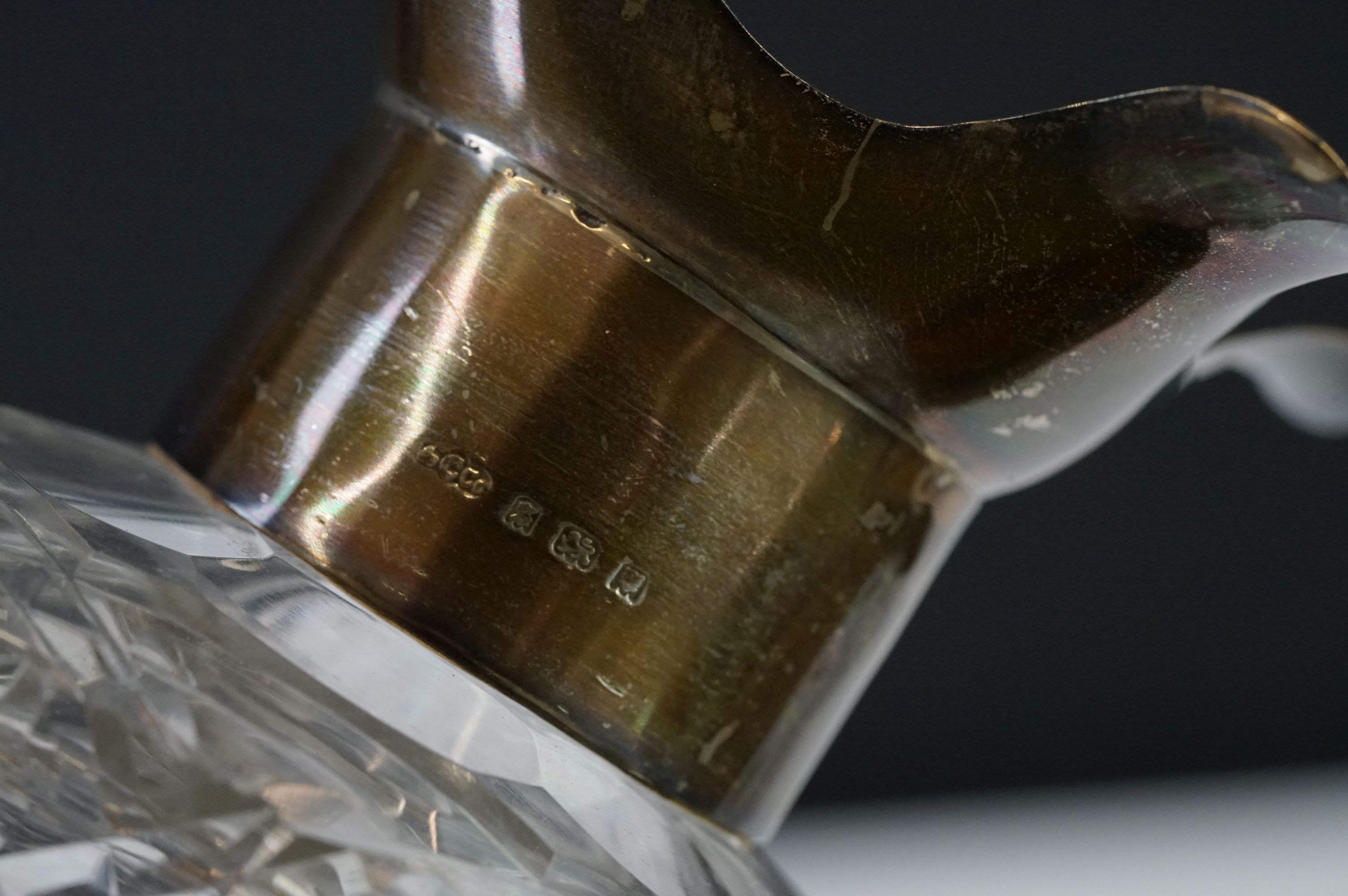 A cut glass decanter with fully hallmarked sterling silver collar, assay marked for London and dated - Image 11 of 11