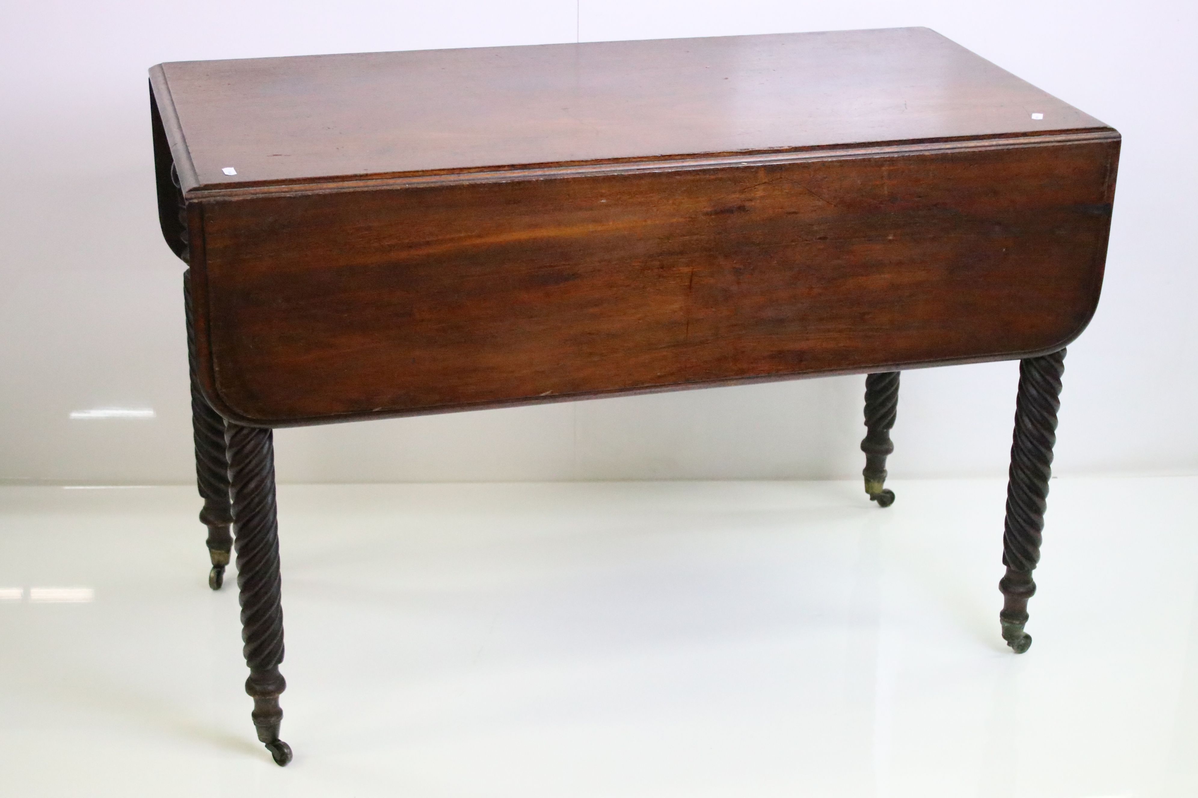 19th century Mahogany Pembroke Table with drawer to end, raised on barley-twist carved legs and