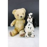 A vintage Merrythought Spaniel soft toy together with a teddy bear.