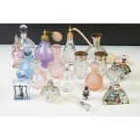 Collection of 19 glass perfume bottles to include a Caithness example with puffer, Egyptian,