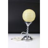 Art Deco Chrome Table Lamp with pale yellow ribbed glass shade above a spiral twist support, with