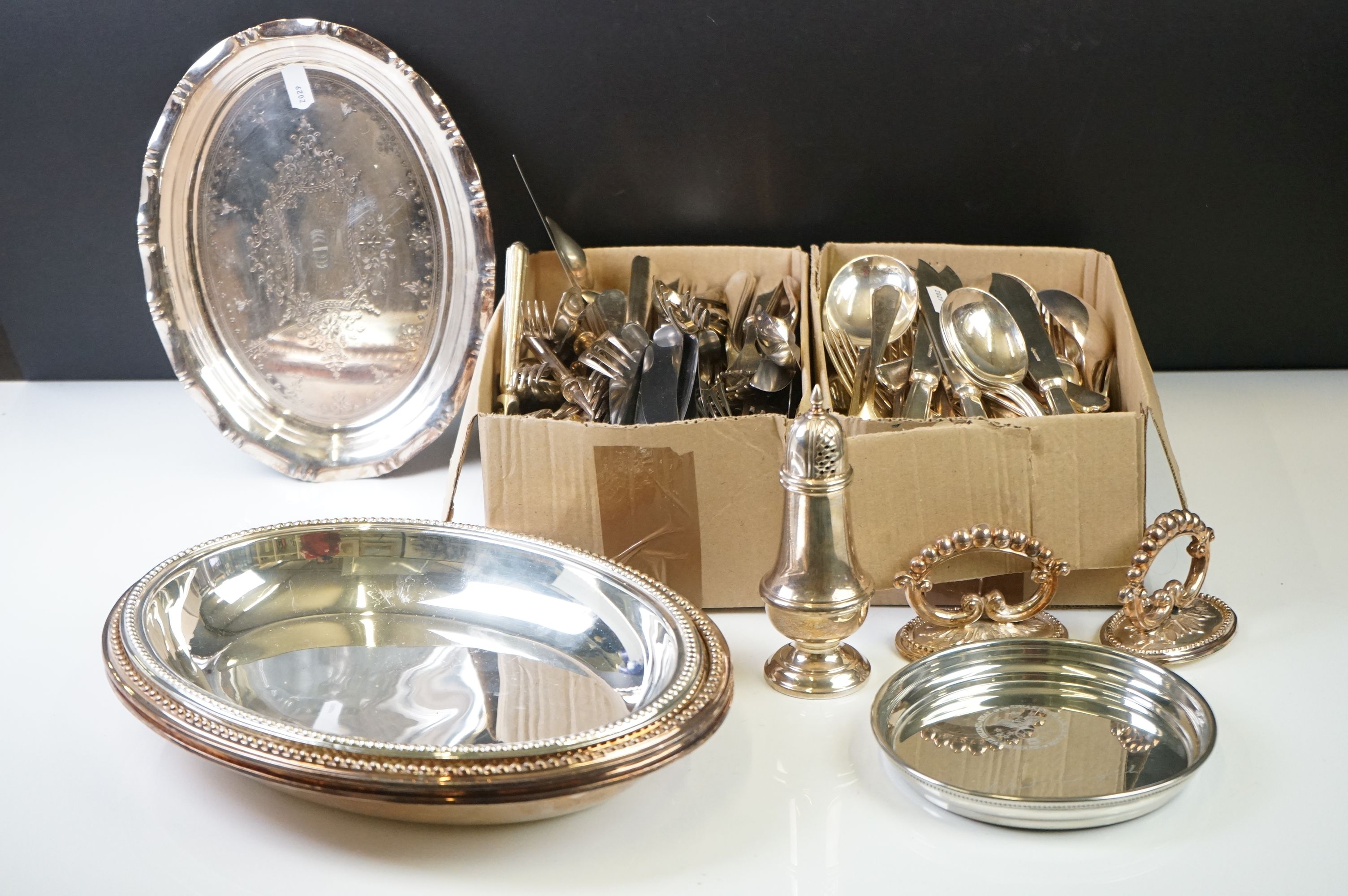 A large collection of mixed silver plated cutlery / flatware together with silver plated dishes