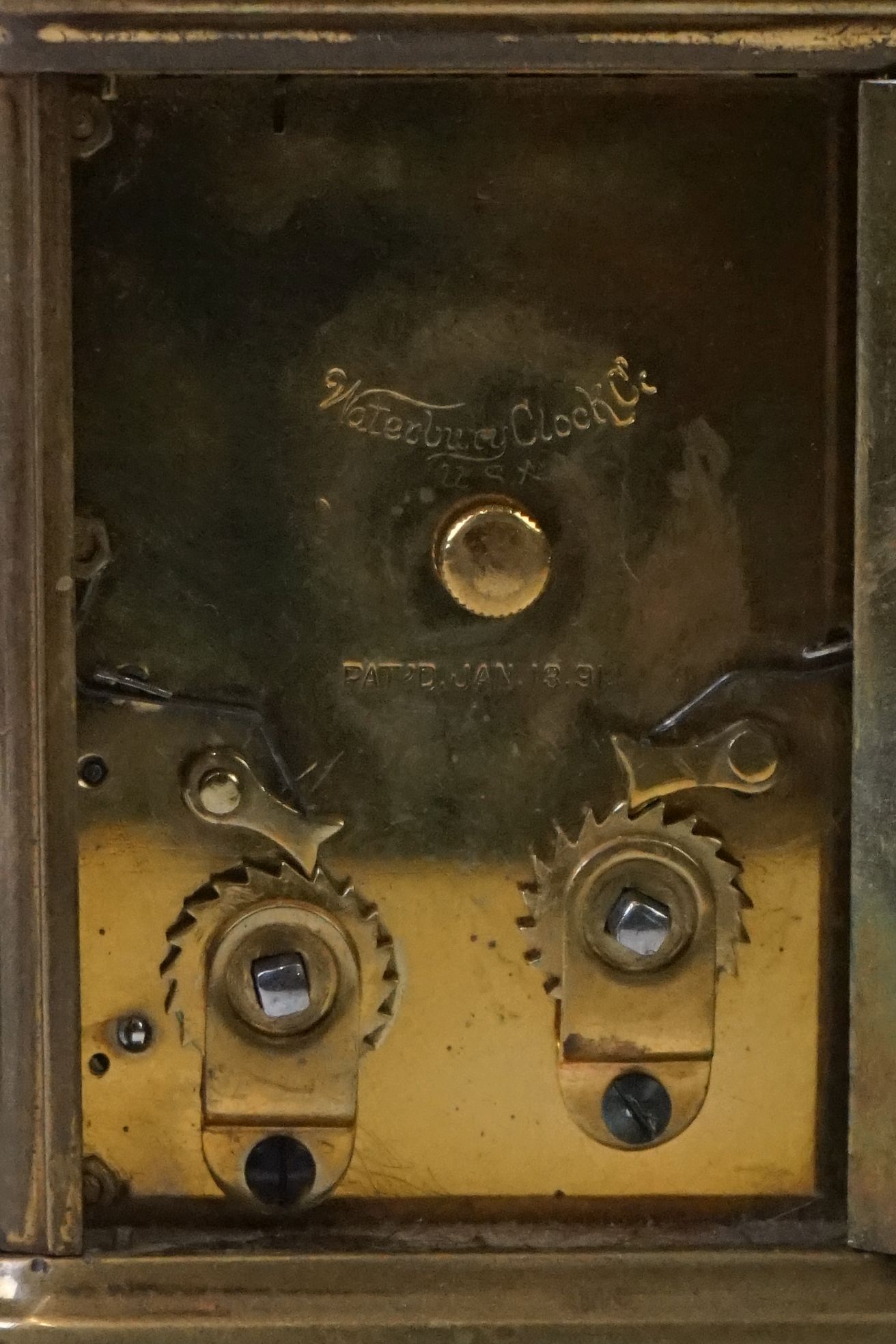 A brass cased carriage clock with beveled glass panels and white enamel dial, complete with key. - Image 8 of 15