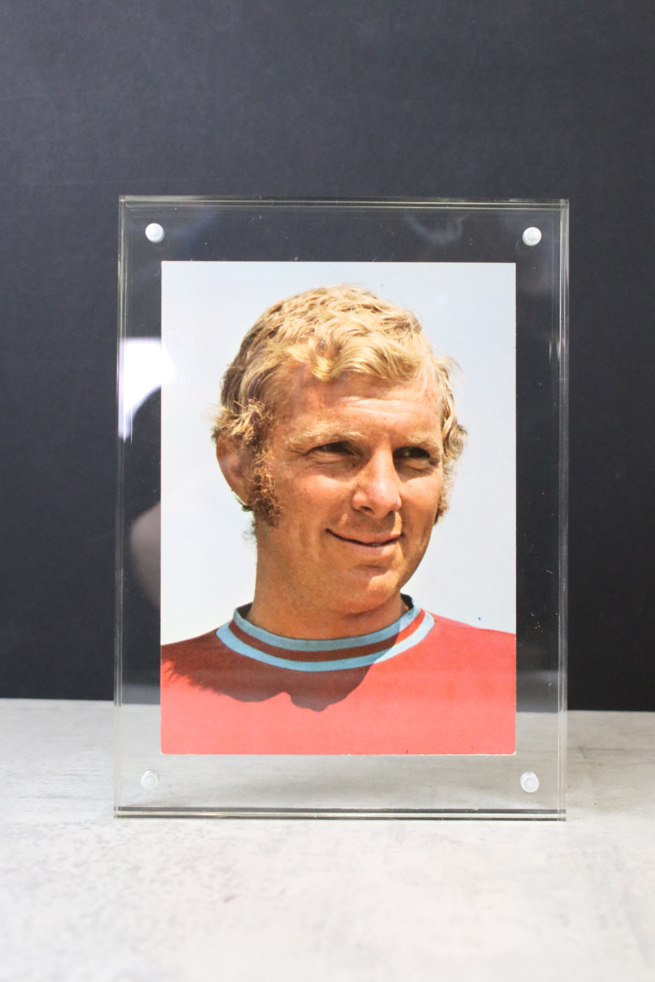 A signed Bobby Moore postcard mounted within a clear framed together with an unsigned example. - Image 2 of 6