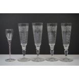 Set of four early 20th century Lobmeyr Champagne flutes of faceted form, with etched acanthus leaf