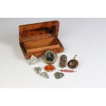 A small collection of vintage costume jewellery to include a mourning brooch contained within a