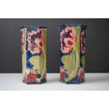 Two Bursley Ware ' Seed Poppy ' pattern tube lined hexagonal vases, designed by Charlotte Rhead,