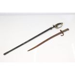 A military sword with brass basket and crowned cypher to handle, complete with scabbard together