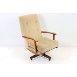 Mid century Retro Upholstered Swivel Chair upholstered in beige fabric, 62cm wide x 95cm high