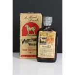 A boxed Miniature White Horse whisky bottle with contents.