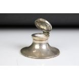 A fully hallmarked sterling silver capstan inkwell complete with liner, assay marked for Birmingham.