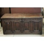 19th century Oak Coffer with carved frieze and four moulded panel front, 131cm long x 53cm deep x