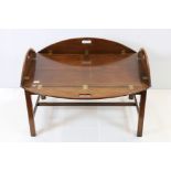 Mahogany Low Butler's Table in the George III manner, the oval tray top with hinged sides and